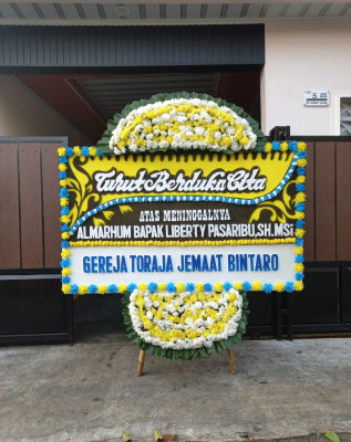 Papan Bunga Duka di Rantau Utara